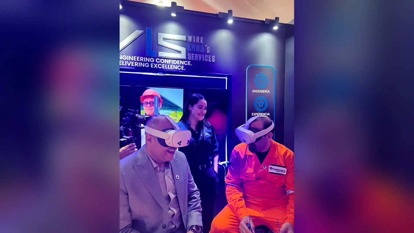 Attendees trying virtual reality headsets at a stand