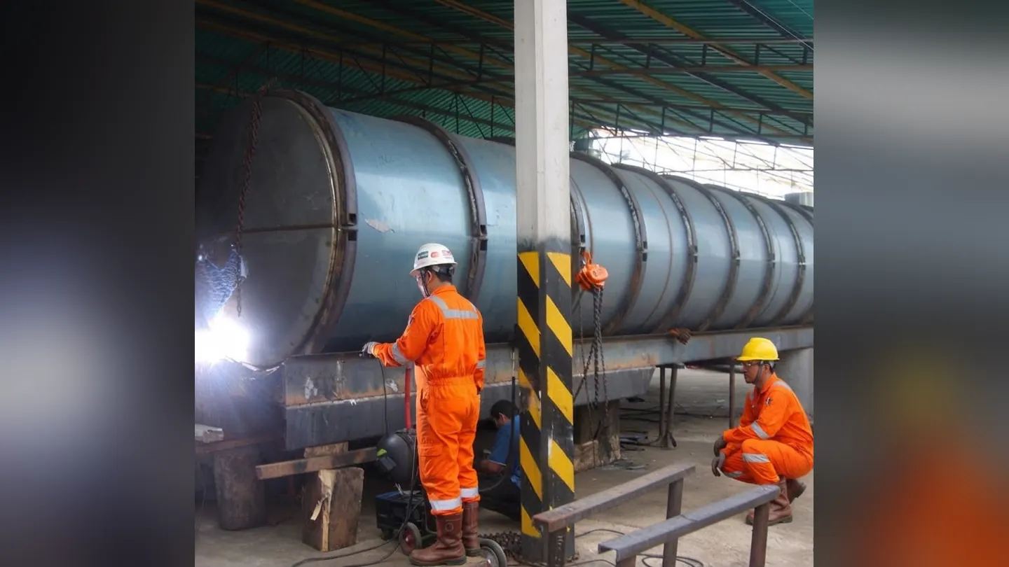 Welders working on a tanker chassis
