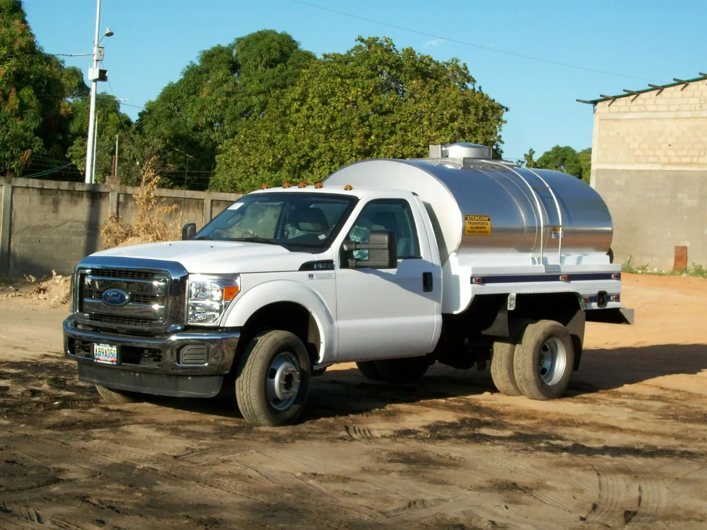 Truck with a finished stainless steel tank in the yard