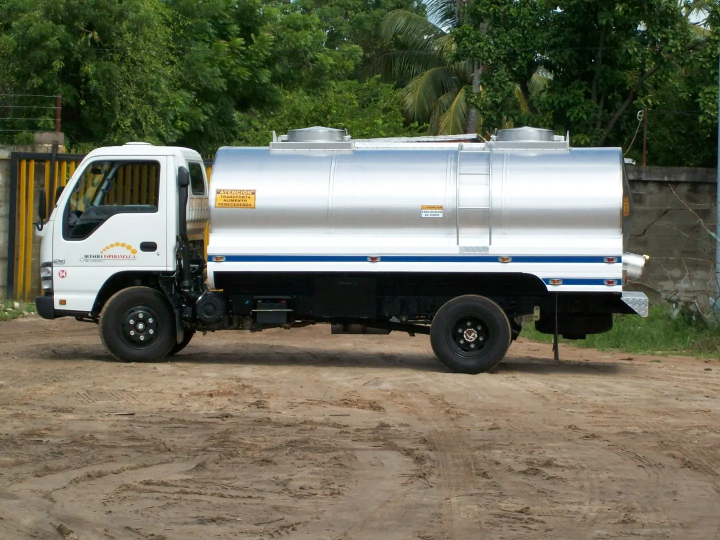 Side view of a tanker truck with an access ladder