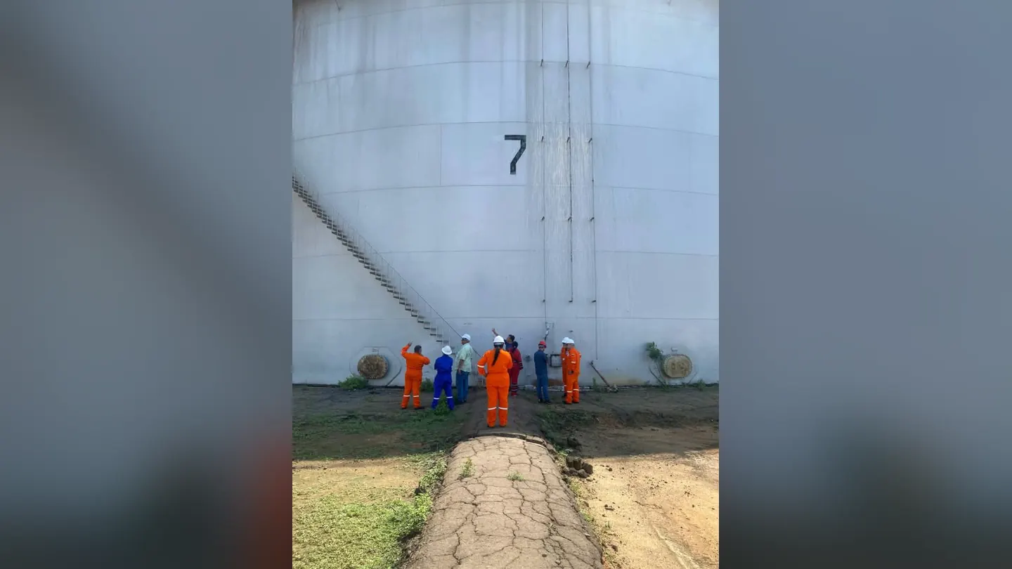 Crew inspecting a storage tank