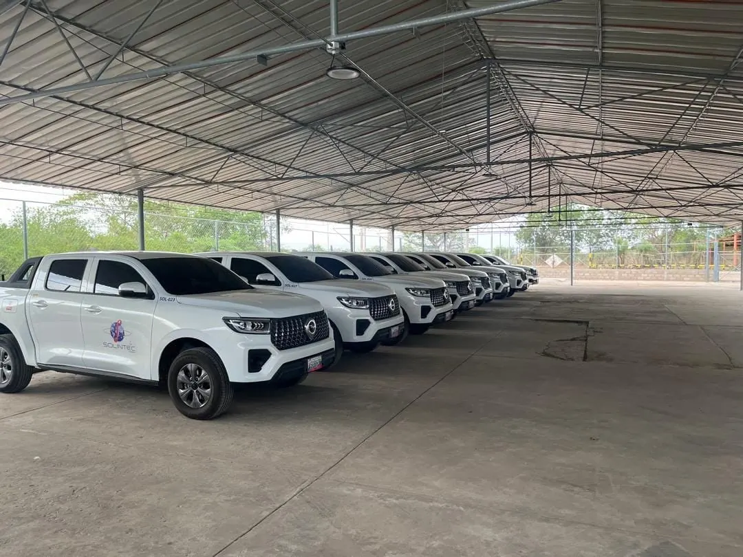 Fleet of pickup trucks parked at the PPD base